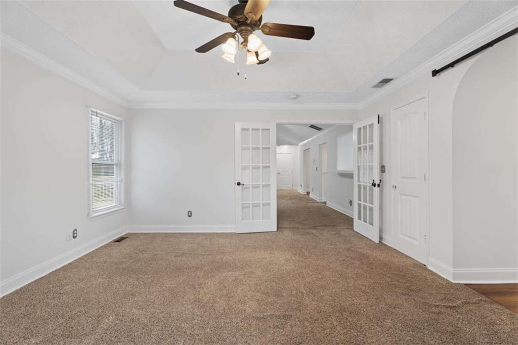 2284 Alcovy Station Road Covington, GA 30014 - Photo 24 of 45 a view of an empty room with a window