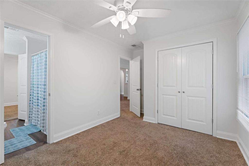 2284 Alcovy Station Road Covington, GA 30014 - Photo 31 of 45 a view of an empty room with a window