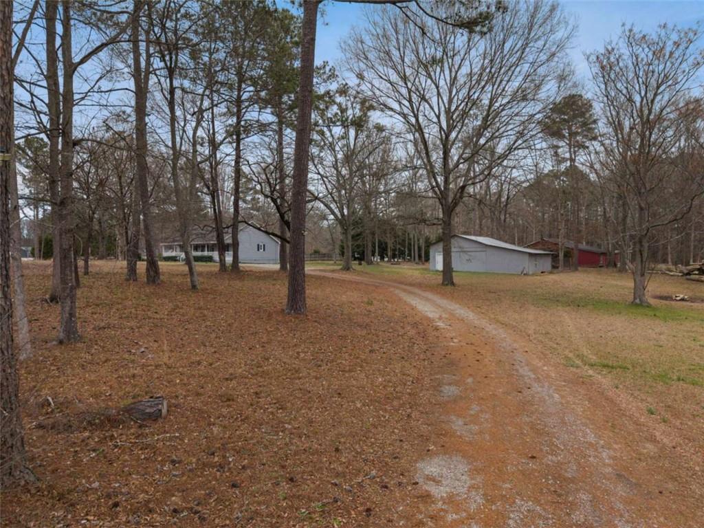 2284 Alcovy Station Road Covington, GA 30014 - Photo 42 of 45 a view of outdoor space with trees