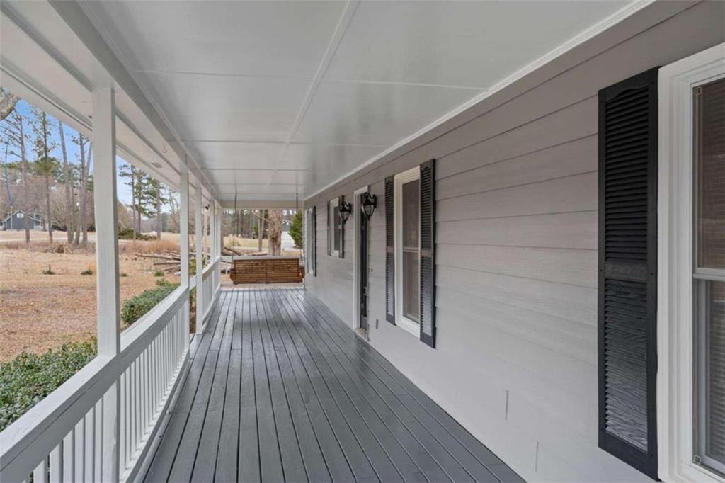 2284 Alcovy Station Road Covington, GA 30014 - Photo 7 of 45 a view of balcony with wooden floor