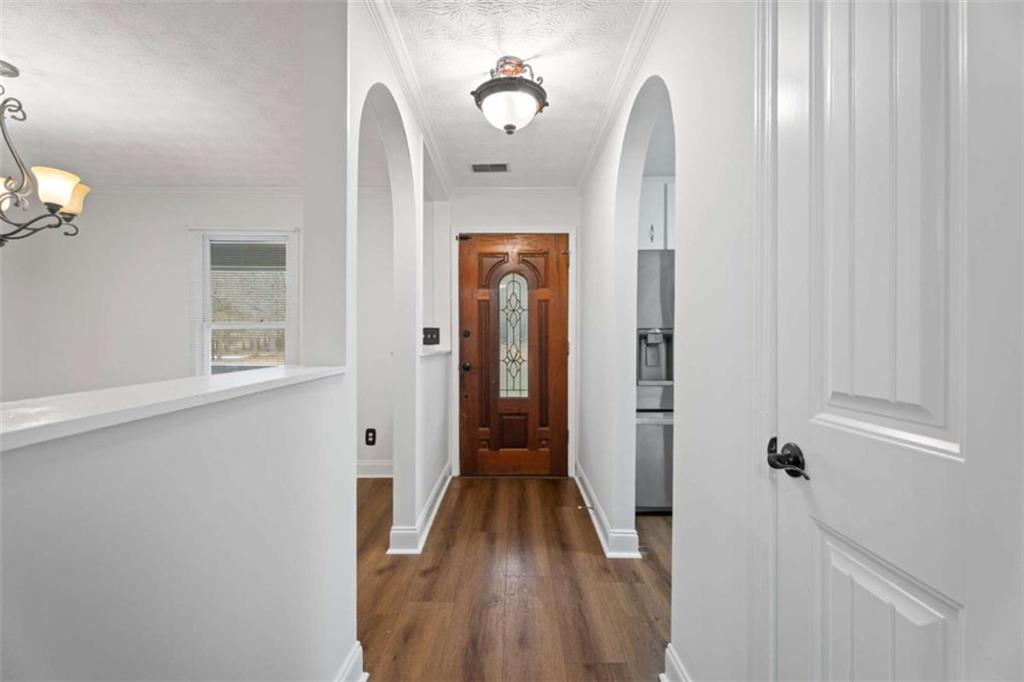 2284 Alcovy Station Road Covington, GA 30014 - Photo 10 of 45 a view of a hallway with wooden floor