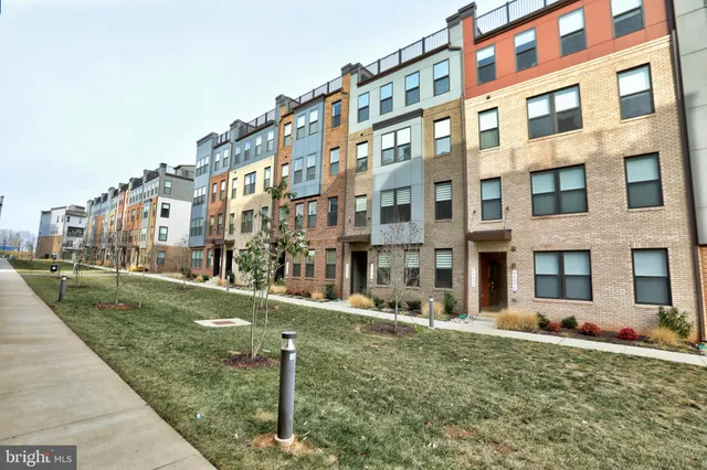 a view of a building with a yard