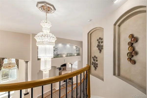 a view of a hallway with windows