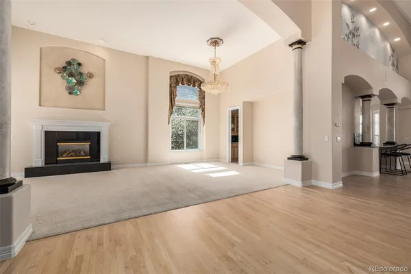 a view of livingroom with furniture and a fireplace