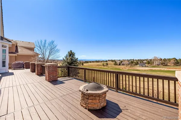 a view of a roof deck with couches
