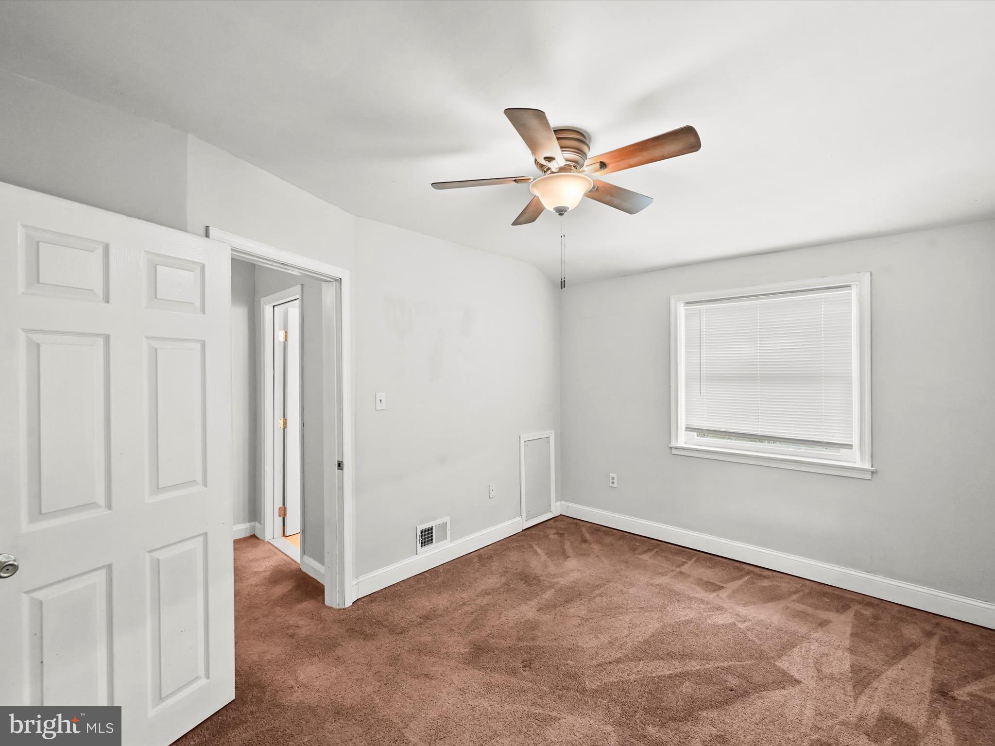 1913 Nevill Road Baltimore, MD 21222 - Photo 22 of 37 a view of an empty room and window