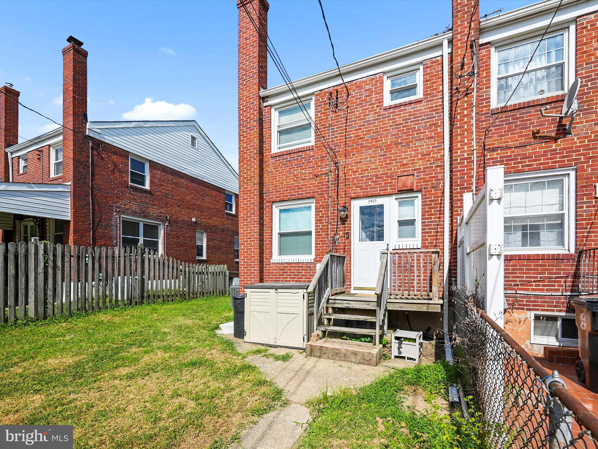 1913 Nevill Road Baltimore, MD 21222 - Photo 30 of 37 a view of a house with backyard and sitting area