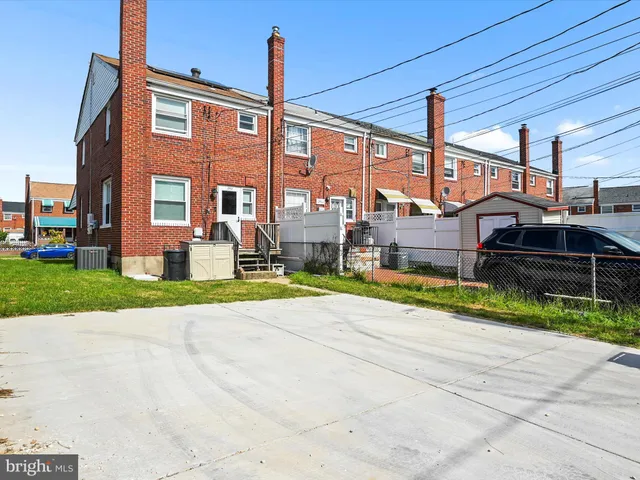 a front view of a house with yard