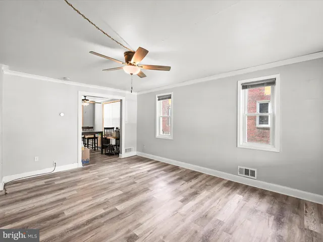 a view of a livingroom with a workspace