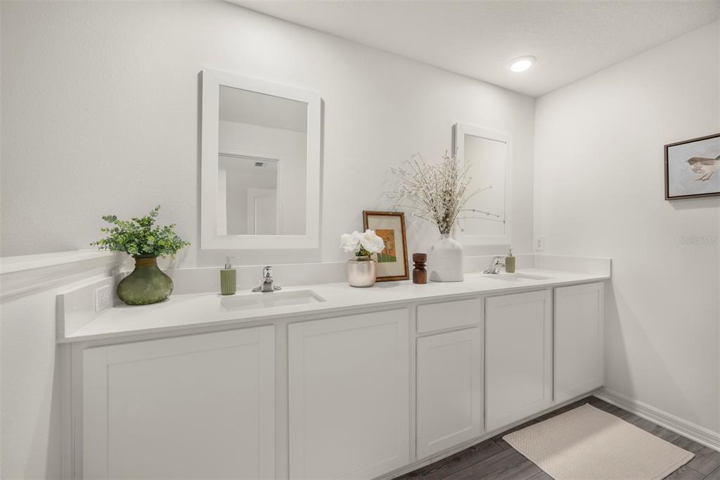 727 Poppy Lane Dundee, FL 33838 - Photo 17 of 31 a bathroom with a sink and a mirror
