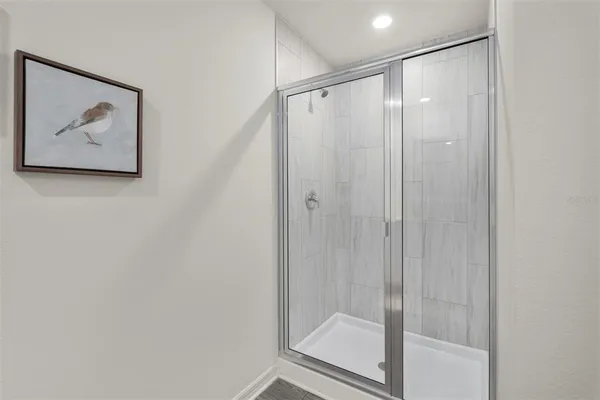 an empty room with a empty space and windows