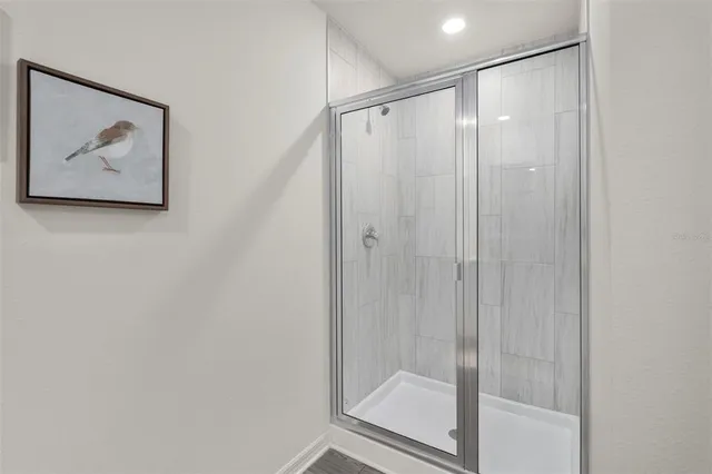 an empty room with a empty space and windows