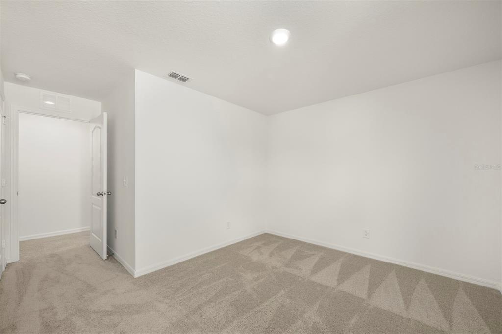 727 Poppy Lane Dundee, FL 33838 - Photo 20 of 31 a view of an empty room
