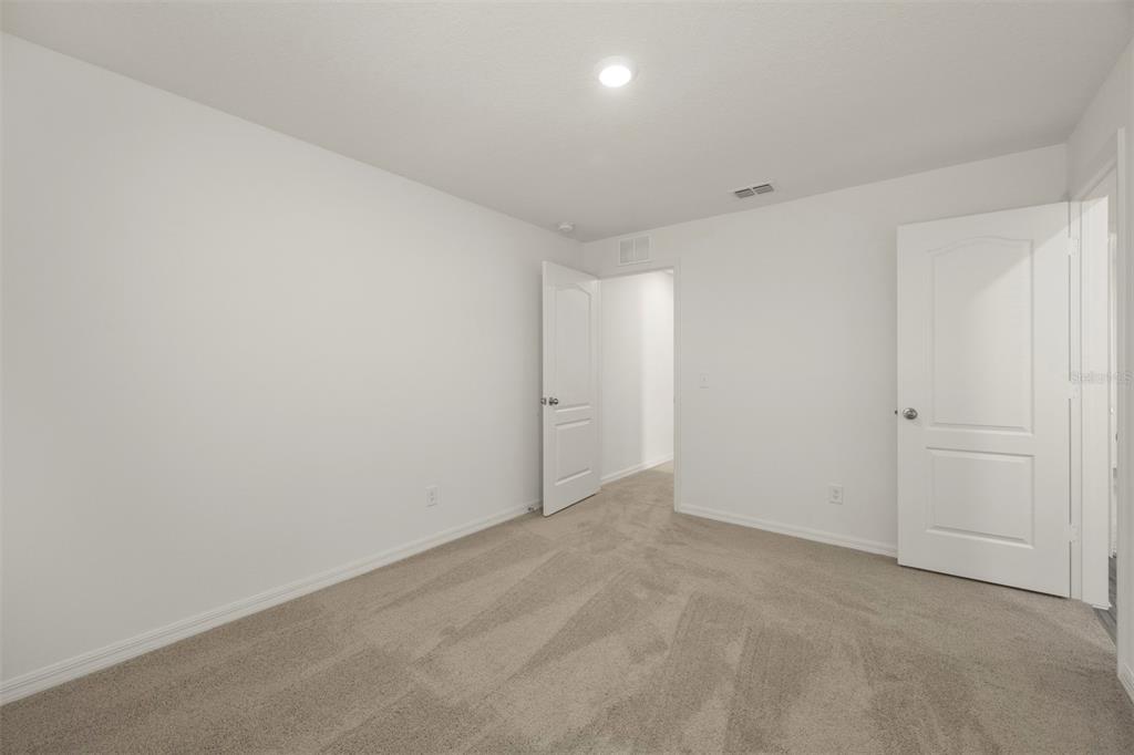 727 Poppy Lane Dundee, FL 33838 - Photo 23 of 31 a view of an empty room