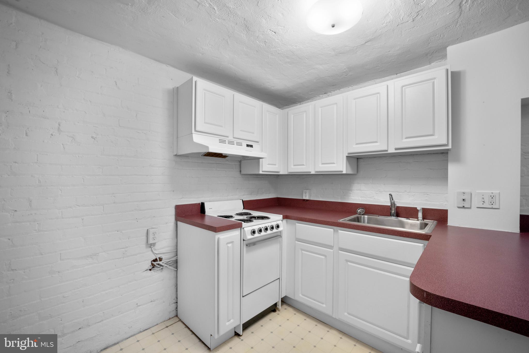 2220 Tunlaw Road Northwest Washington, DC 20007 - Photo 37 of 50 Lower Level Kitchenette
