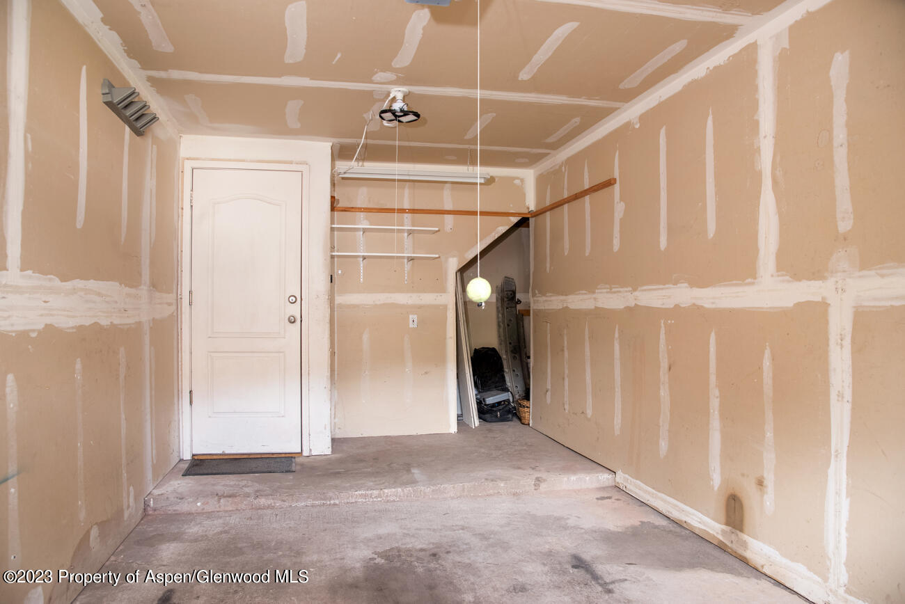 2208 Elk Lane Basalt, CO 81621 - Photo 16 of 20 a view of a hallway with wooden walls and entryway