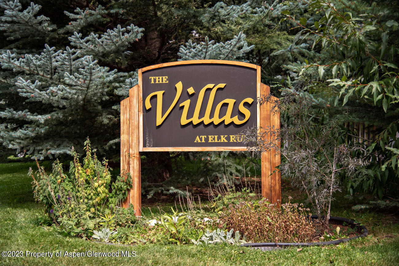 2208 Elk Lane Basalt, CO 81621 - Photo 2 of 20 a sign that is sitting on a brick wall