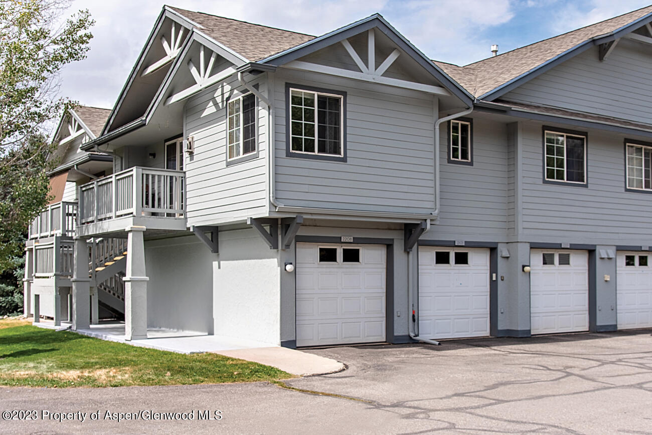 2208 Elk Lane Basalt, CO 81621 - Photo 4 of 20 a front view of a house with a yard