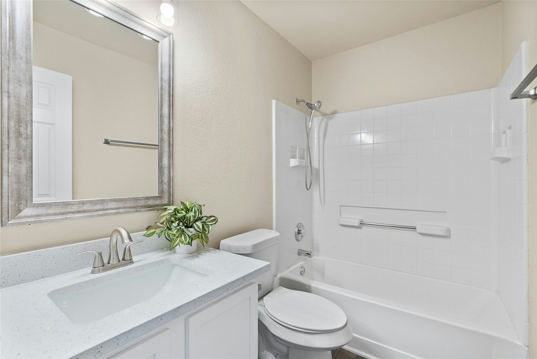 44 Verde Ranch Loop Leander, TX 78641 - Photo 16 of 24 a bathroom with a sink toilet and shower