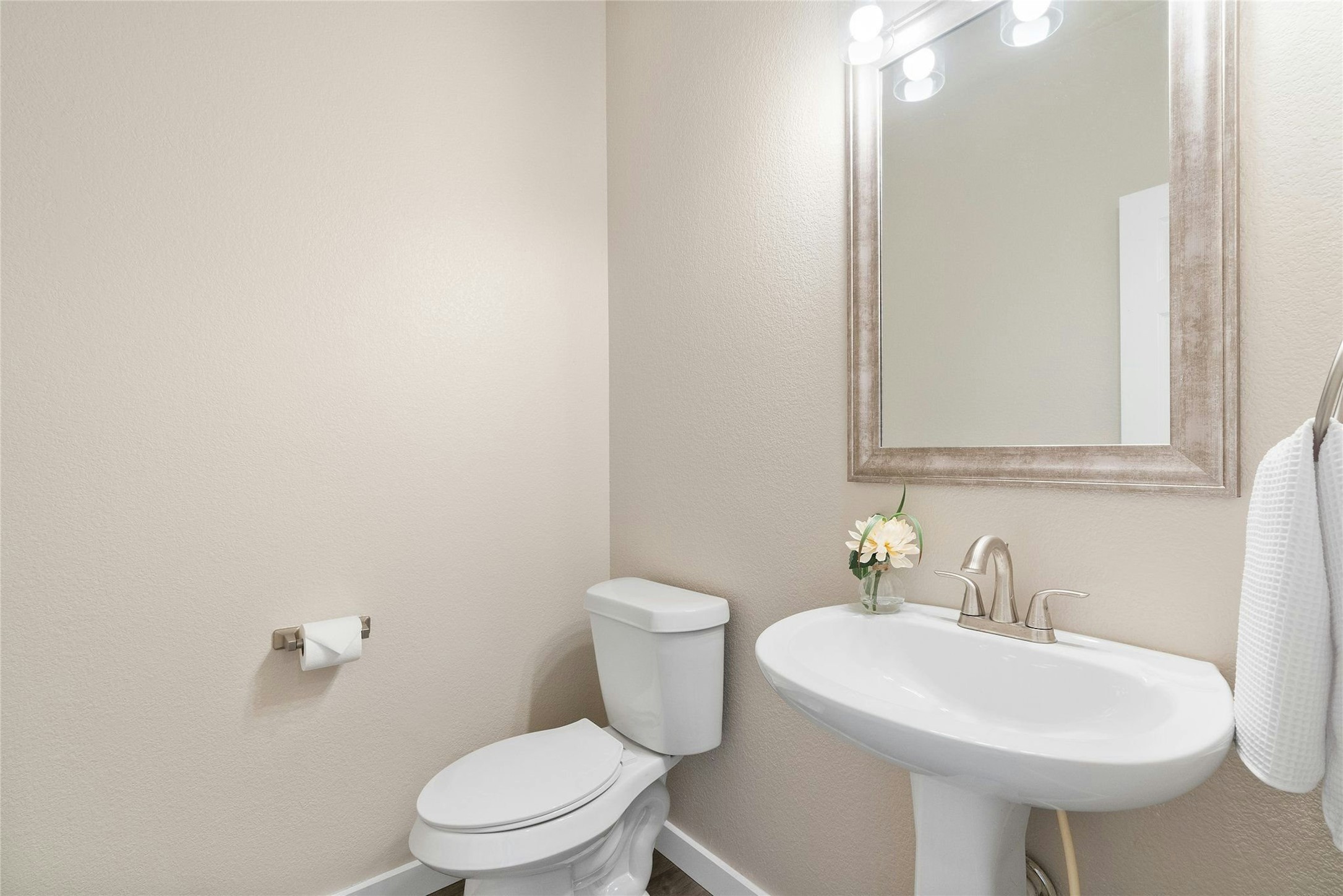 44 Verde Ranch Loop Leander, TX 78641 - Photo 17 of 24 a bathroom with a sink a toilet and mirror
