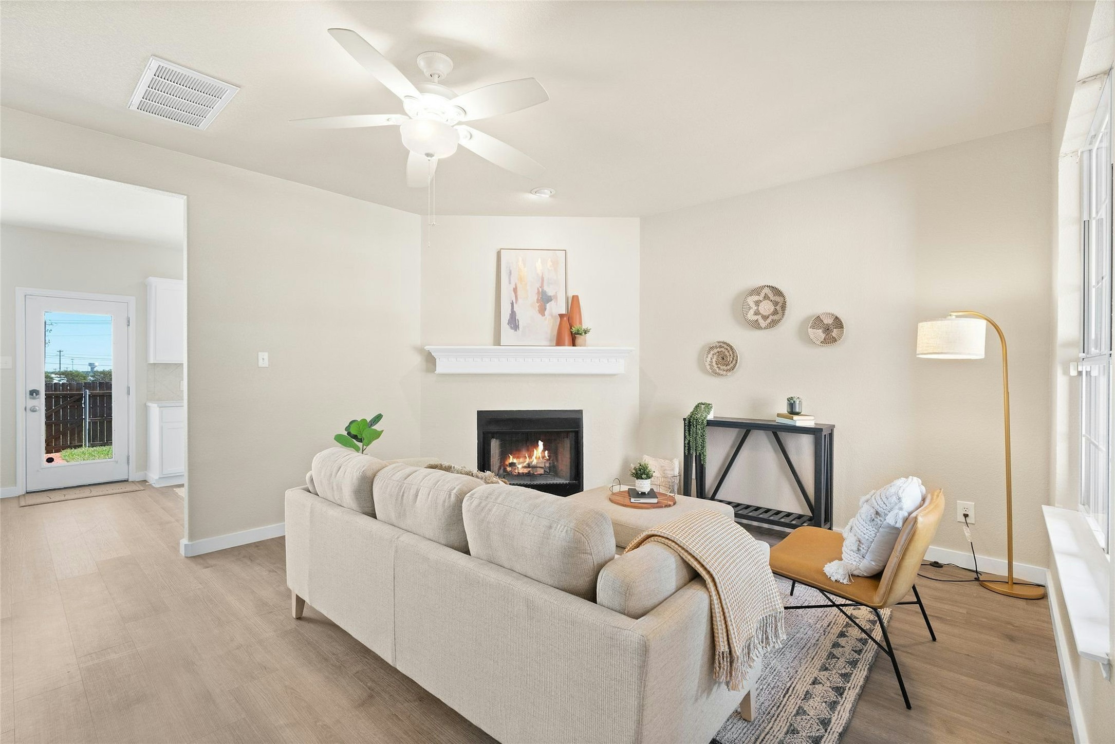 44 Verde Ranch Loop Leander, TX 78641 - Photo 5 of 24 a living room with furniture and a fireplace