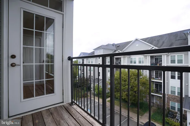 a view of a house with a window and wooden floor