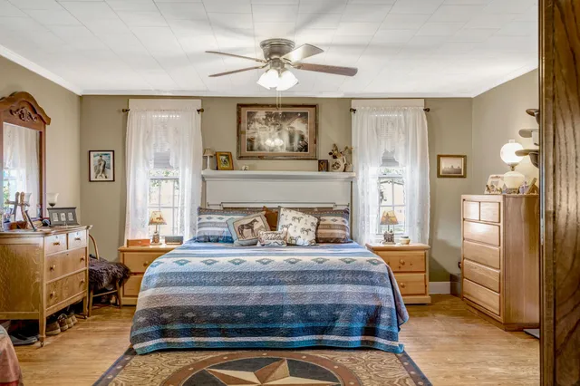 a kitchen with stainless steel appliances granite countertop a refrigerator and a stove