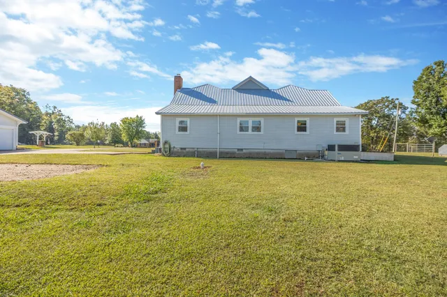 a view of a balcony with furniture