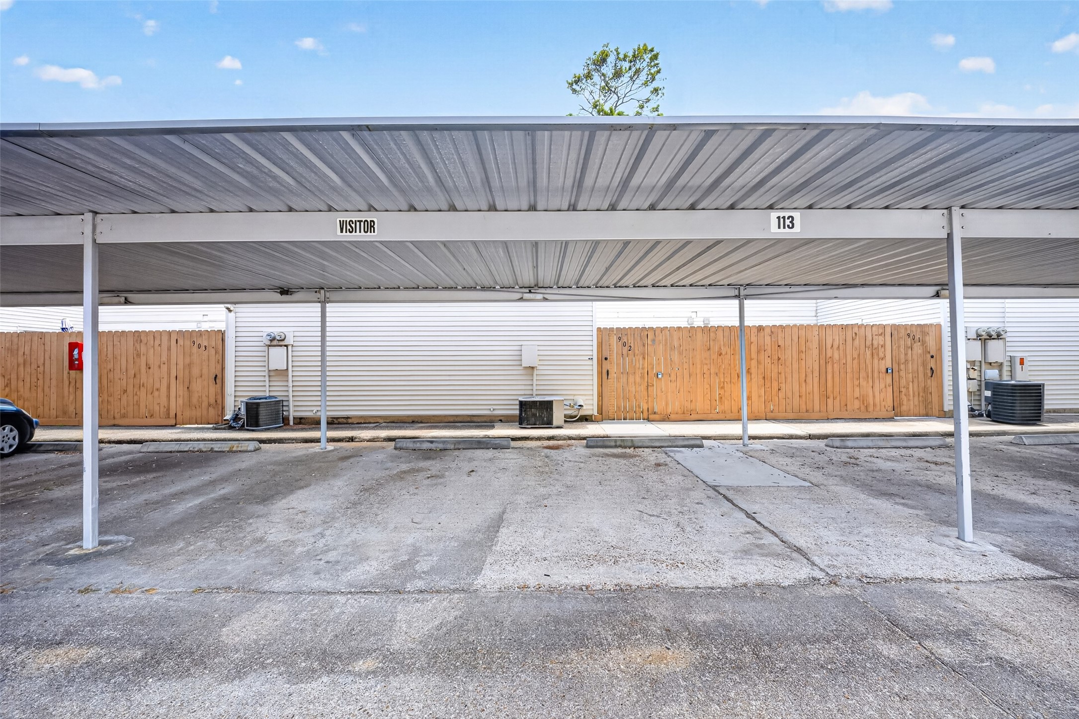 6401 Deihl Road, Unit 902 Houston, TX 77092 - Photo 28 of 35 Enjoy the convenience of an assigned carport and ample visitor parking, ensuring ease for you and your guests.