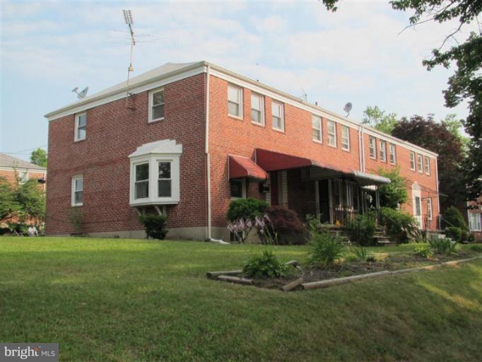 5900 Hillen Road Baltimore, MD 21239 - Photo 9 of 11 a front view of a house with a yard