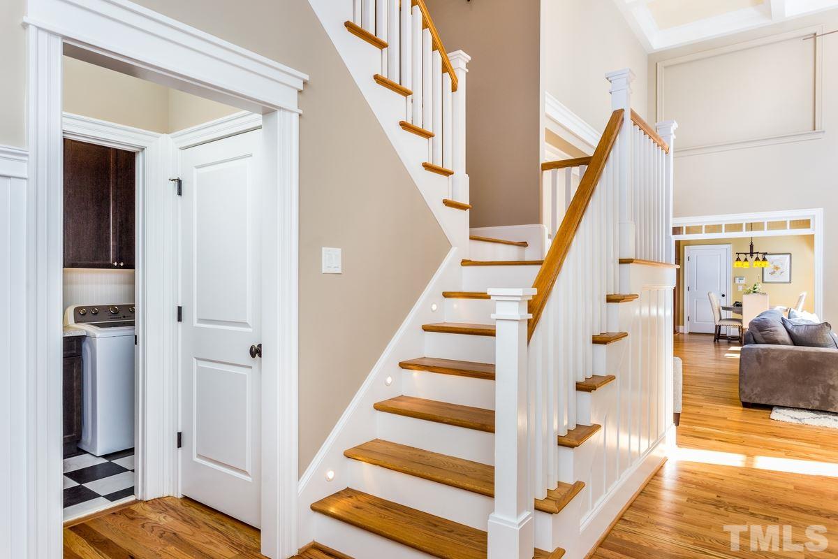 1300 Dixie Trail Raleigh, NC 27607 - Photo 2 of 24 a view of entryway with wooden floor and staircase