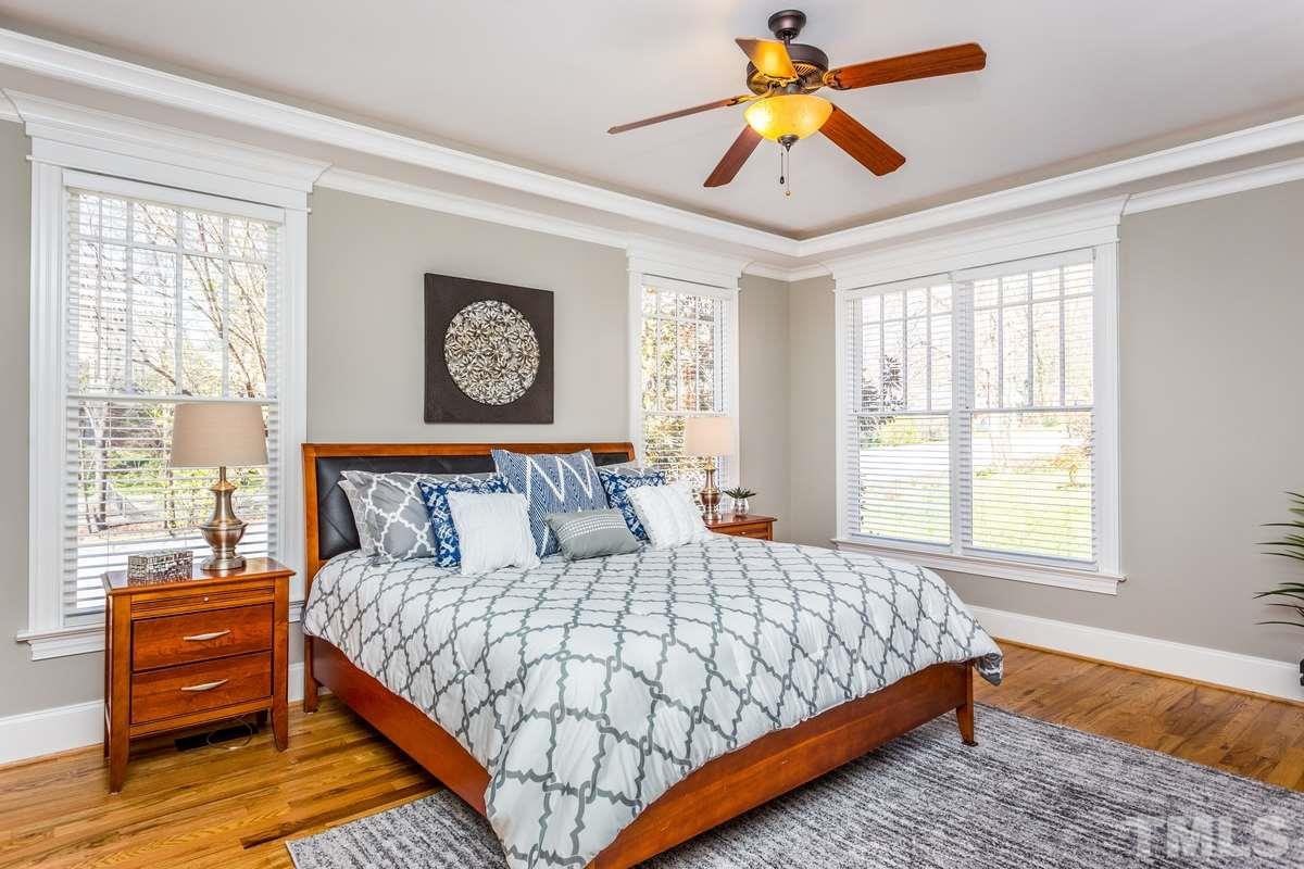 1300 Dixie Trail Raleigh, NC 27607 - Photo 11 of 24 a bedroom with a bed and a window