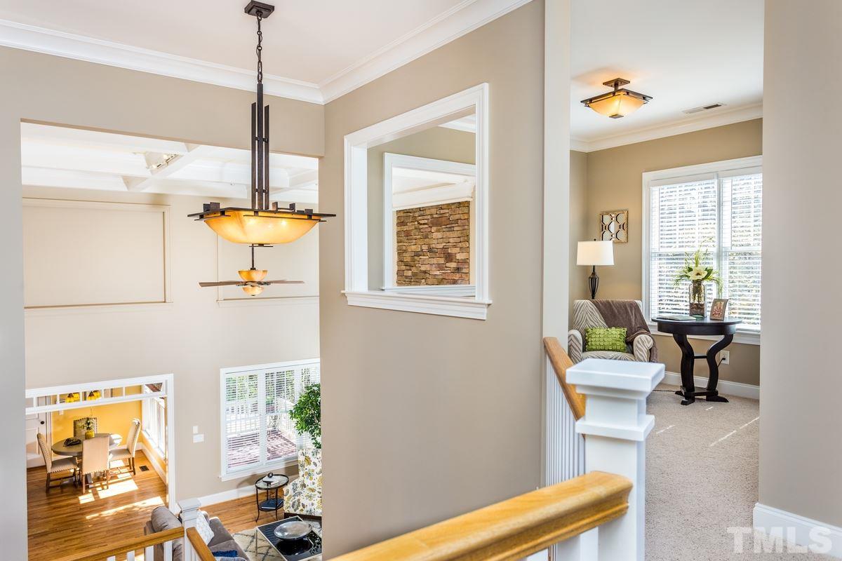 1300 Dixie Trail Raleigh, NC 27607 - Photo 14 of 24 a living room with furniture and a window