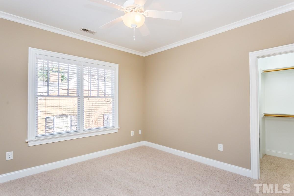 1300 Dixie Trail Raleigh, NC 27607 - Photo 16 of 24 a view of an empty room with a window