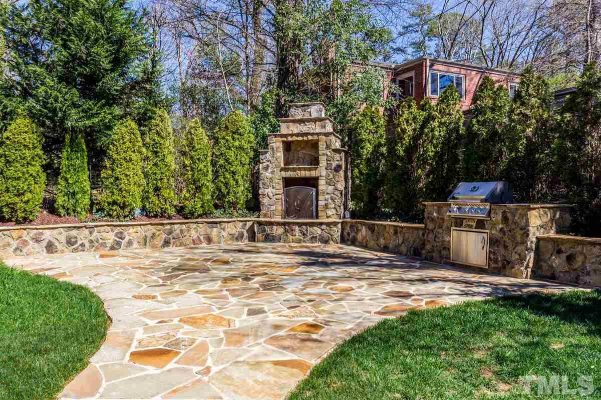 1300 Dixie Trail Raleigh, NC 27607 - Photo 24 of 24 a view of a house with backyard and sitting area