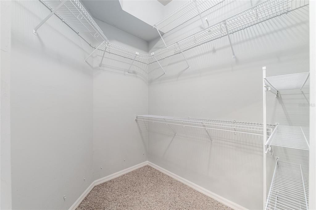10614 Southwest 15th Lane Gainesville, FL 32607 - Photo 39 of 85 a view of a room with racks on the wall
