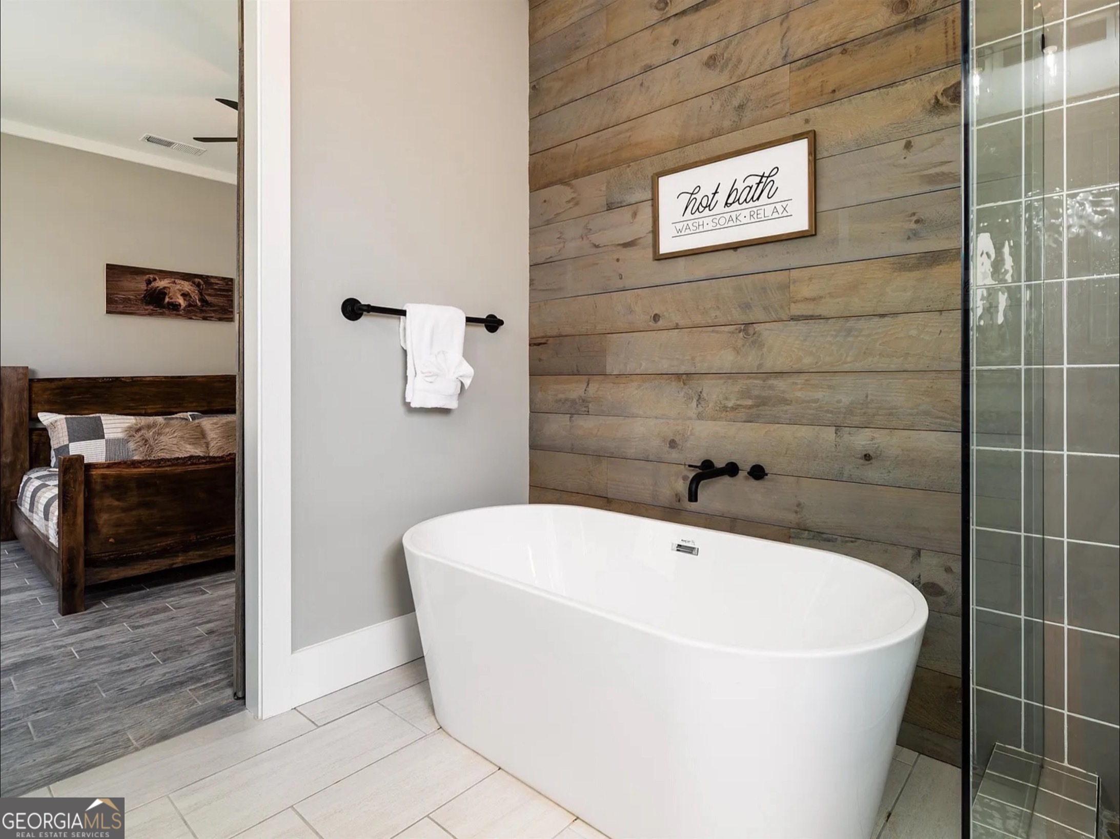 2119 Star Creek Road Morganton, GA 30560 - Photo 11 of 30 a white bath tub sitting in a bathroom