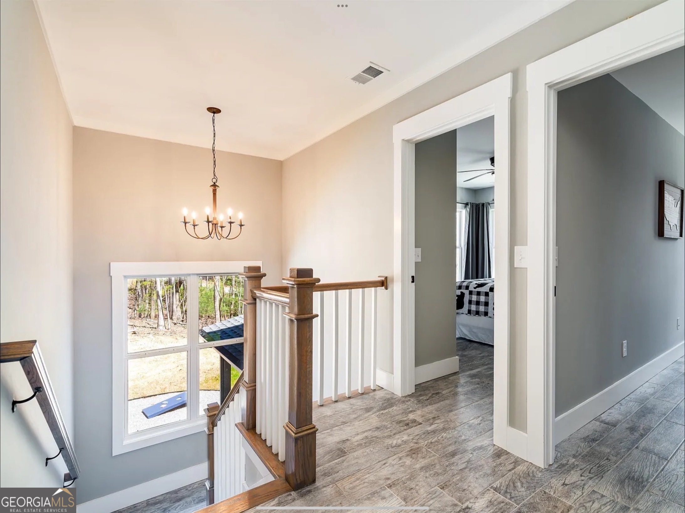 2119 Star Creek Road Morganton, GA 30560 - Photo 15 of 30 a view of an entryway with wooden floor and door