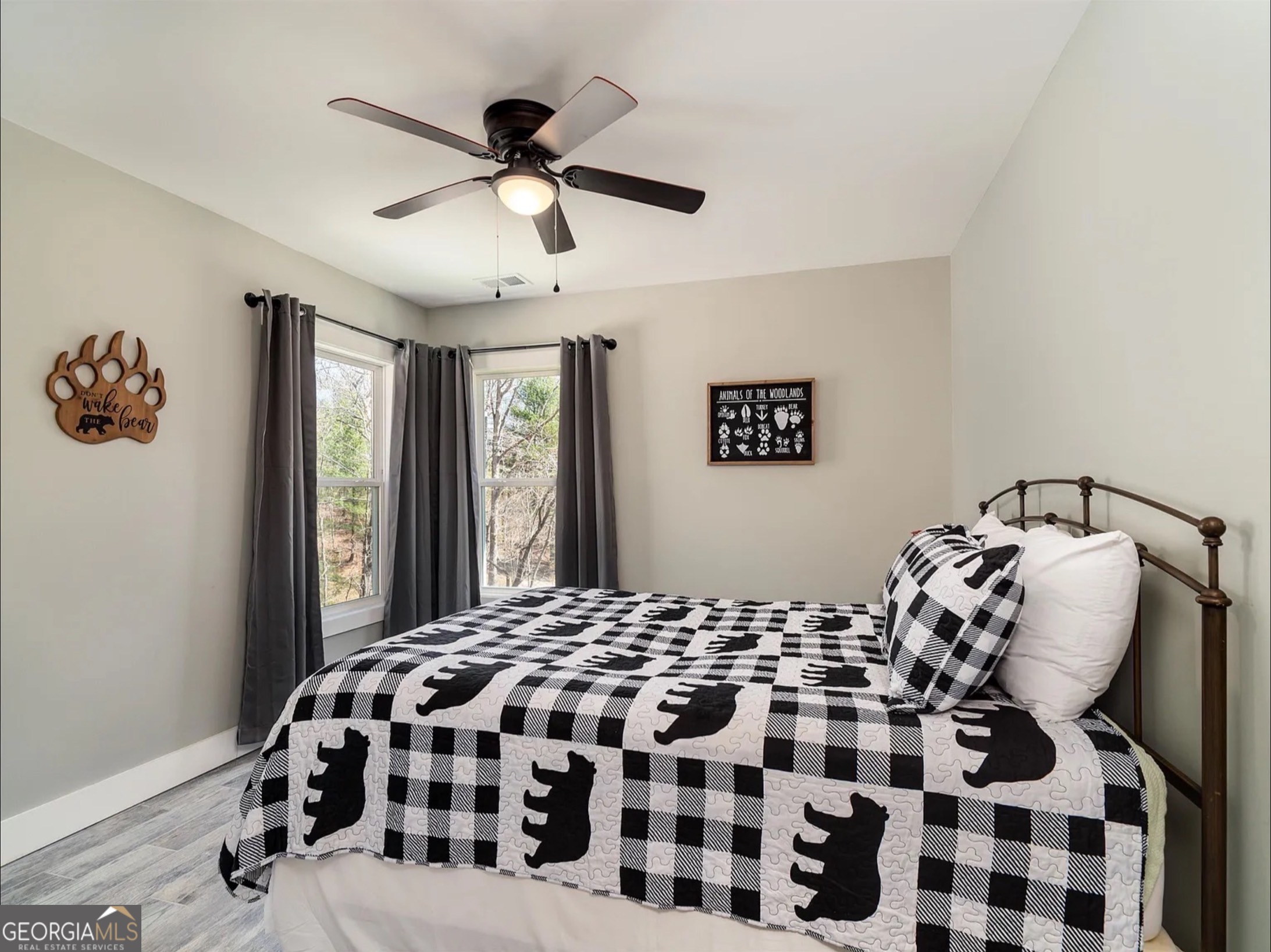 2119 Star Creek Road Morganton, GA 30560 - Photo 16 of 30 a bedroom with a bed and a lamp