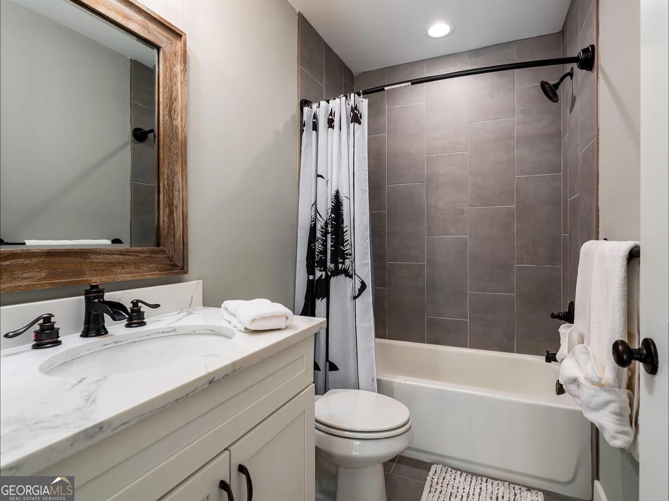 2119 Star Creek Road Morganton, GA 30560 - Photo 18 of 30 a bathroom with a sink toilet tub and shower