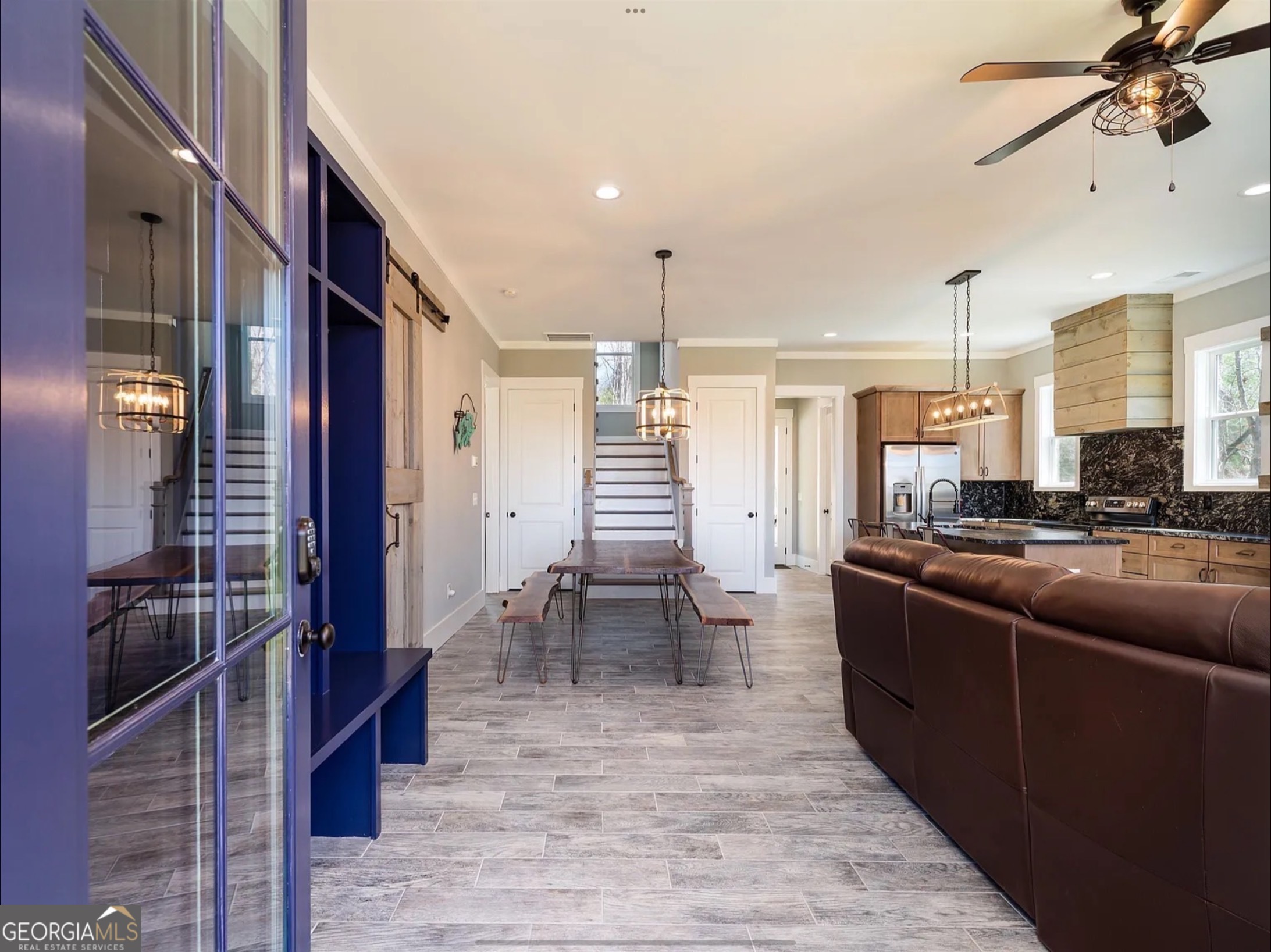 2119 Star Creek Road Morganton, GA 30560 - Photo 2 of 30 a dining hall with stainless steel appliances kitchen island granite countertop a sink and a refrigerator