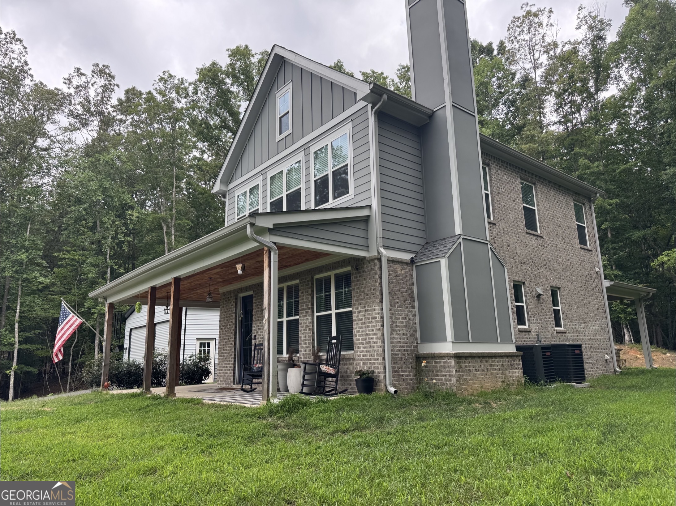 2119 Star Creek Road Morganton, GA 30560 - Photo 23 of 30 a front view of a house with a yard and porch