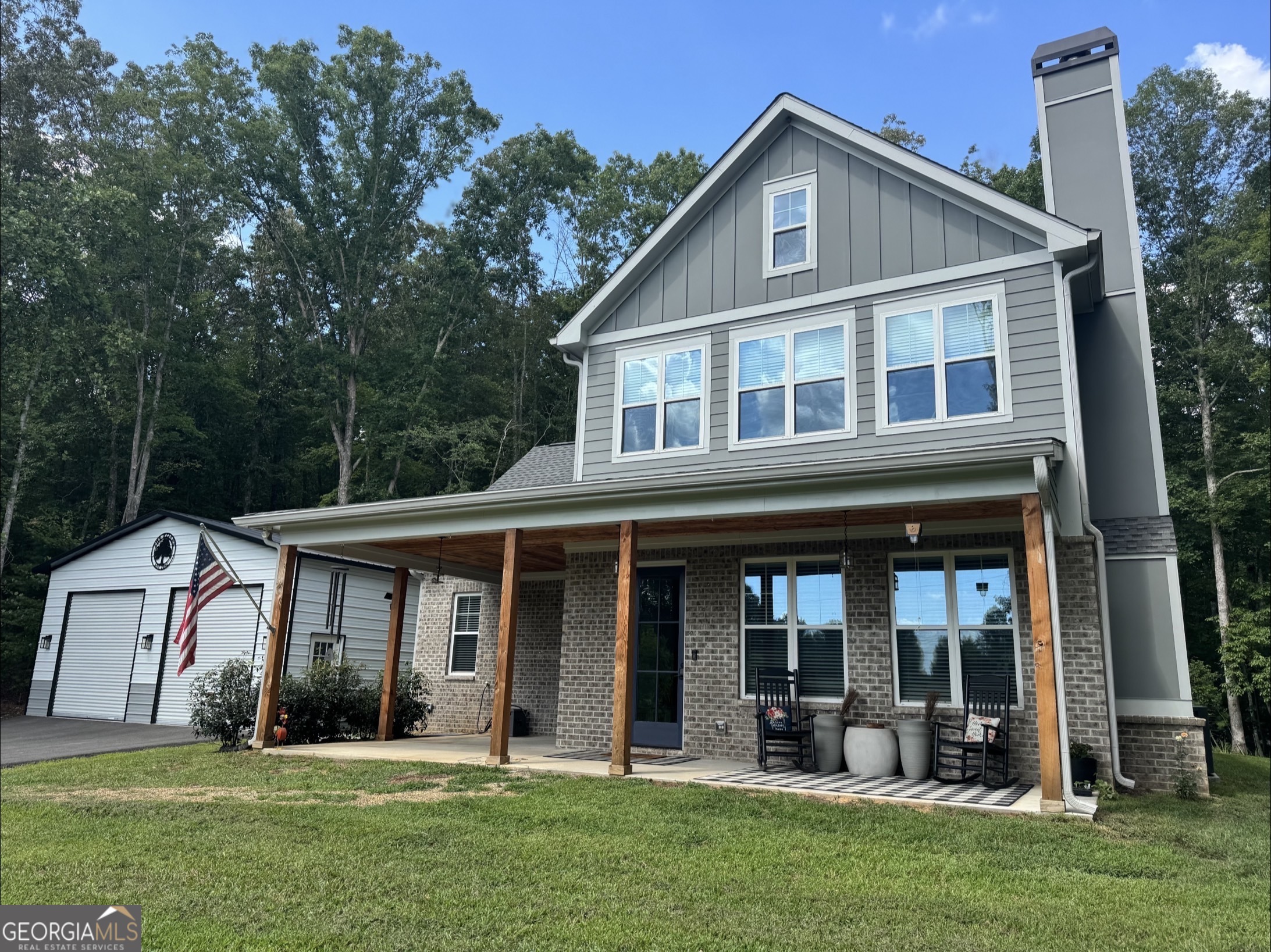 2119 Star Creek Road Morganton, GA 30560 - Photo 25 of 30 a front view of a house with a yard