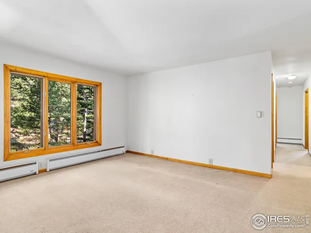 an empty room with sliding door