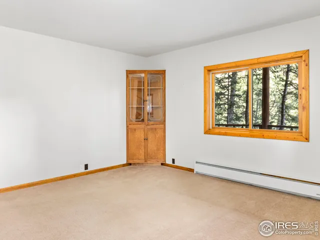 an empty room with window