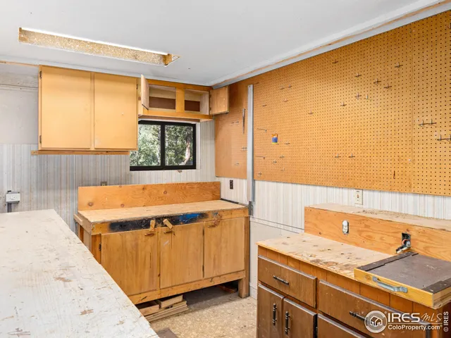 a bathroom with a granite countertop sink and a bathtub