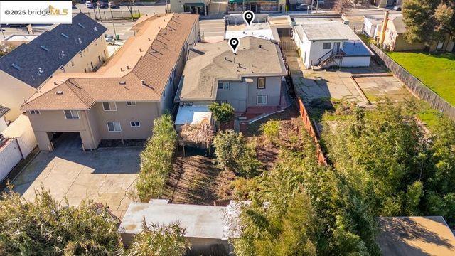 a living room with furniture fireplace and flowers