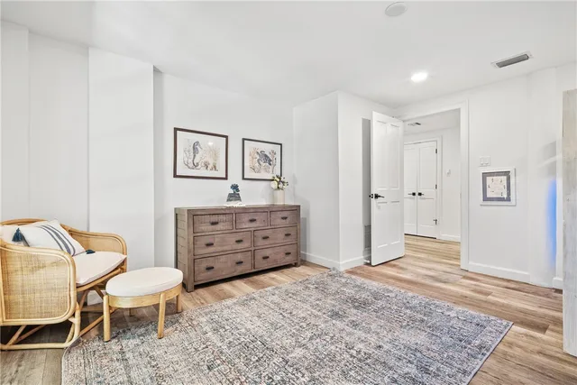 a view of kitchen with furniture and wooden floor