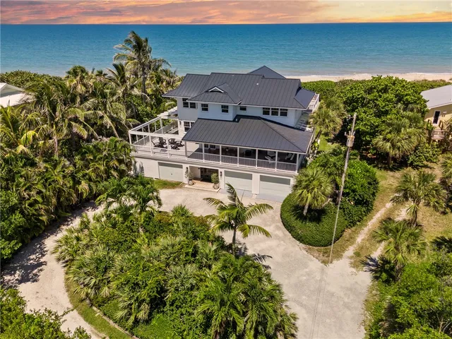 an aerial view of a house with a garden