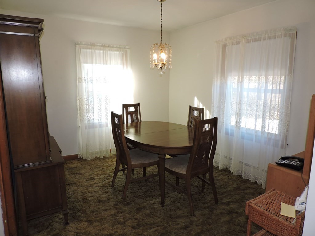 110 Gore Road Webster, MA 01570 - Photo 14 of 42 a view of a dining room with furniture and window